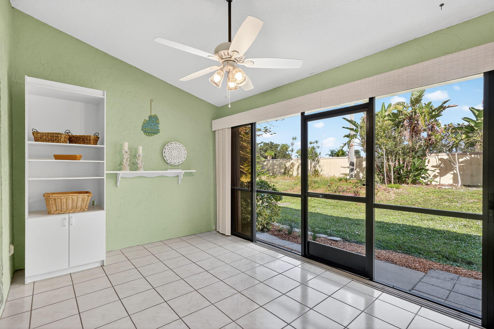 7643 Southeast Sugar Sand Circle Hobe Sound, FL 33455 - Photo 21 of 44 a view of a livingroom with a large window