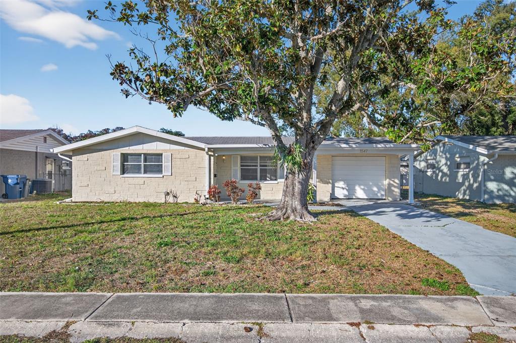 7547 Cumber Drive New Port Richey, FL 34653 - Photo 4 of 60
