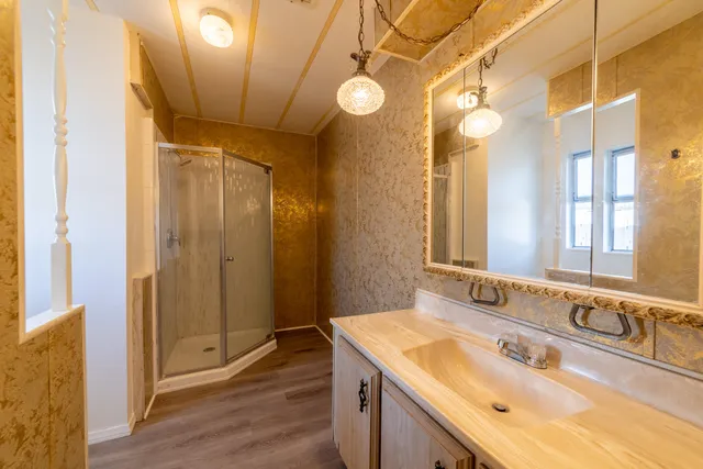 a bathroom with a sink and a mirror