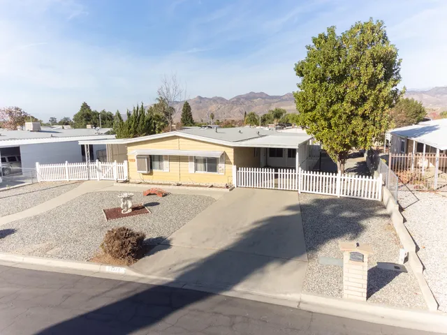 a view of a house with a swimming pool