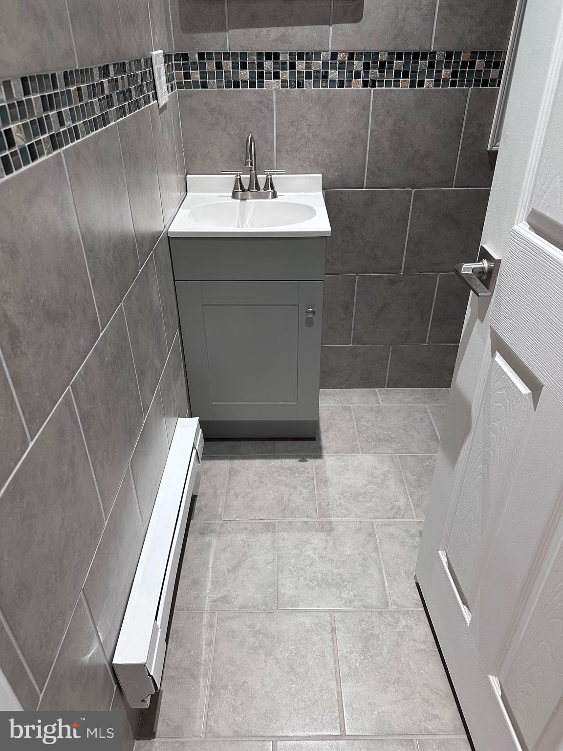 5254 Jefferson Street Philadelphia, PA 19131 - Photo 10 of 30 a bathroom with a sink toilet and shower
