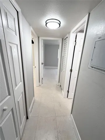 a bed room with bed and a window