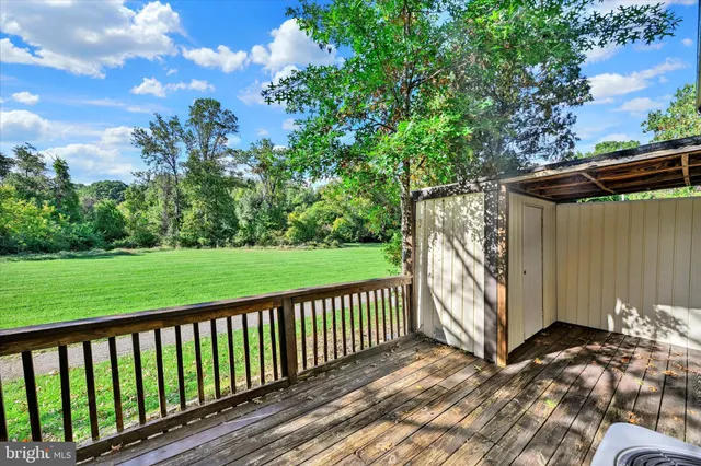 a view of a wooden fence
