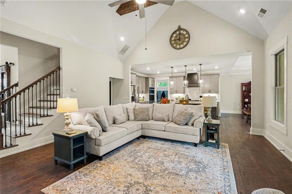 287 Conner Lane Williamson, GA 30292 - Photo 6 of 33 a living room with furniture and a chandelier