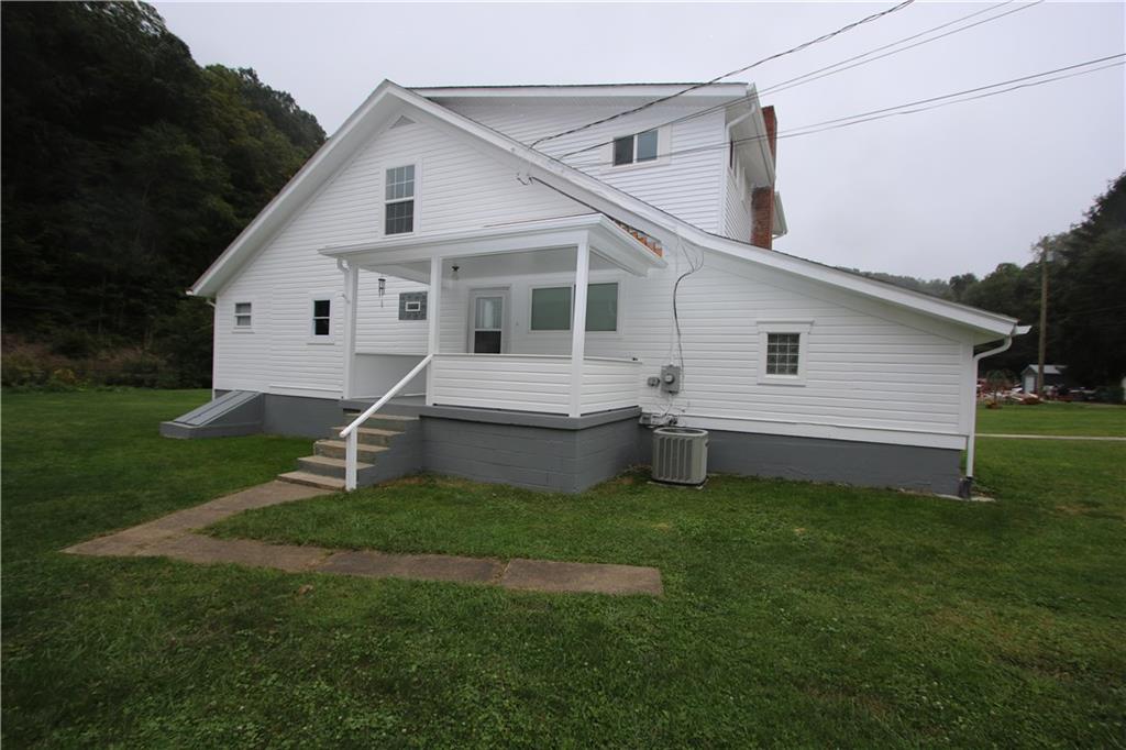 SPACIOUS 4 Bedroom w/ Open 2nd Floor Family Room PLUS 1st Floor Master Bedroom, Den & Laundry!!!