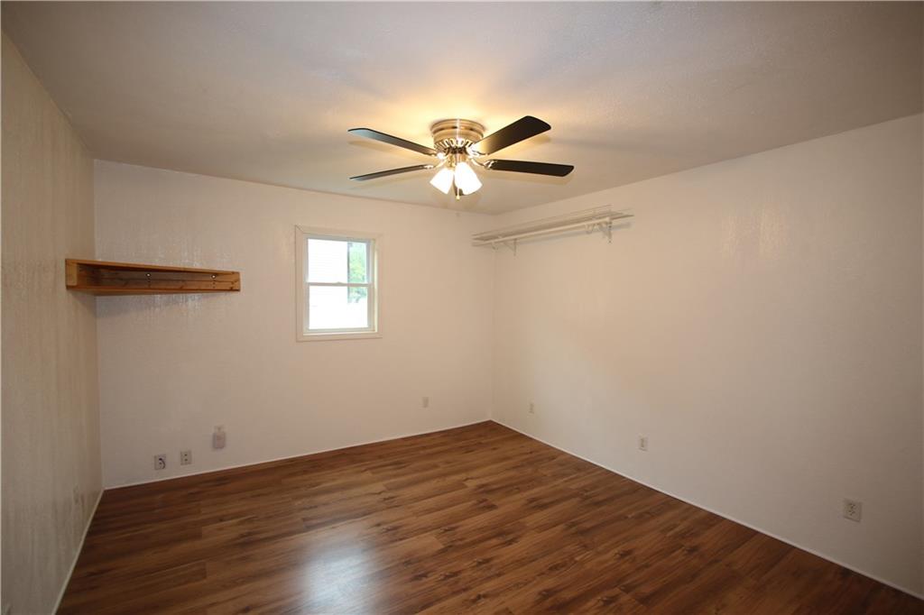 2620 Douglas Run Road Elizabeth, PA 15037 - Photo 15 of 25 Another 13x12 1st Floor Bedroom or possibly Dining Room w/ Newer Flooring & Ceiling Fan Light