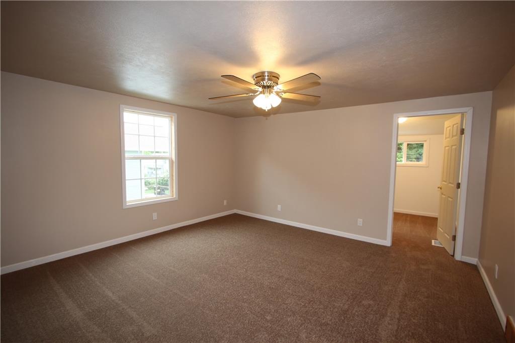 2620 Douglas Run Road Elizabeth, PA 15037 - Photo 18 of 25 Large 14x14 Bedroom on 2nd Floor w/ Newer Carpeting, Attractive Ceiling Fan Light & Big 8x6 Walk-in Closet