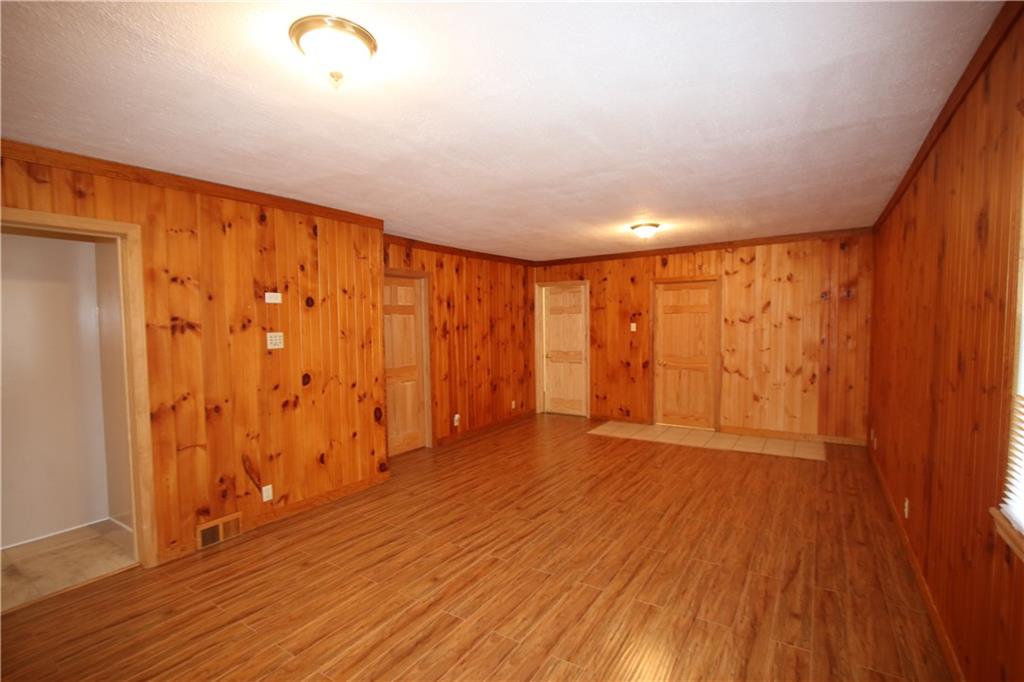 MASSIVE 24x13 Living Room w/ Newer Flooring & Gorgeous Knotty Pine