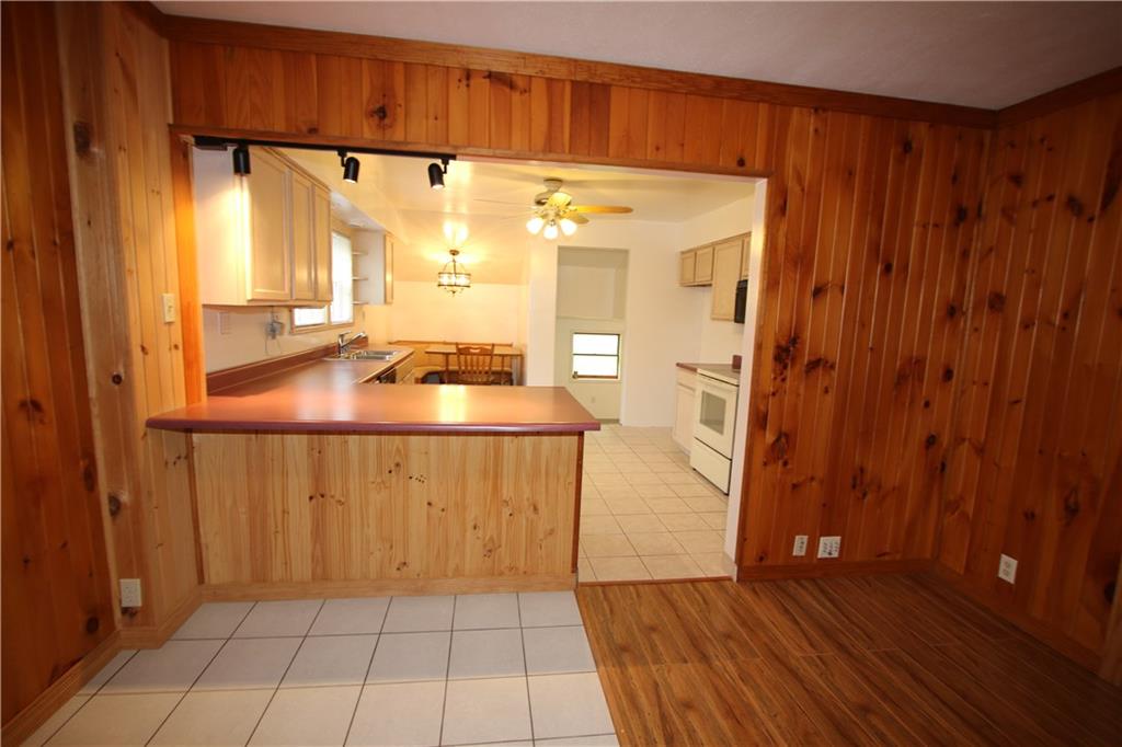 Open Floor Plan from Spacious 24x13 Living / Dining Room combo w/ Ceramic Tile flooring outside Kitchen
