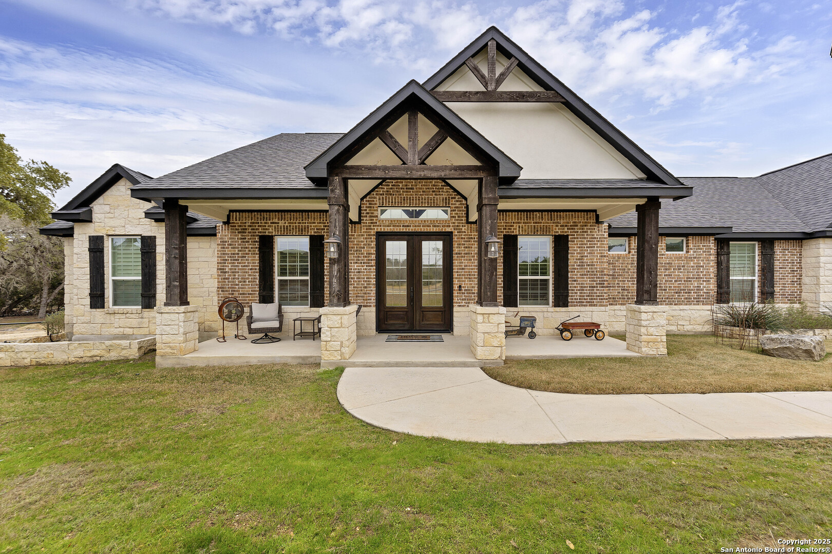 1033 Mystic Shores Boulevard Spring Branch, TX 78070 - Photo 1 of 39 a front view of a house with swimming pool and porch