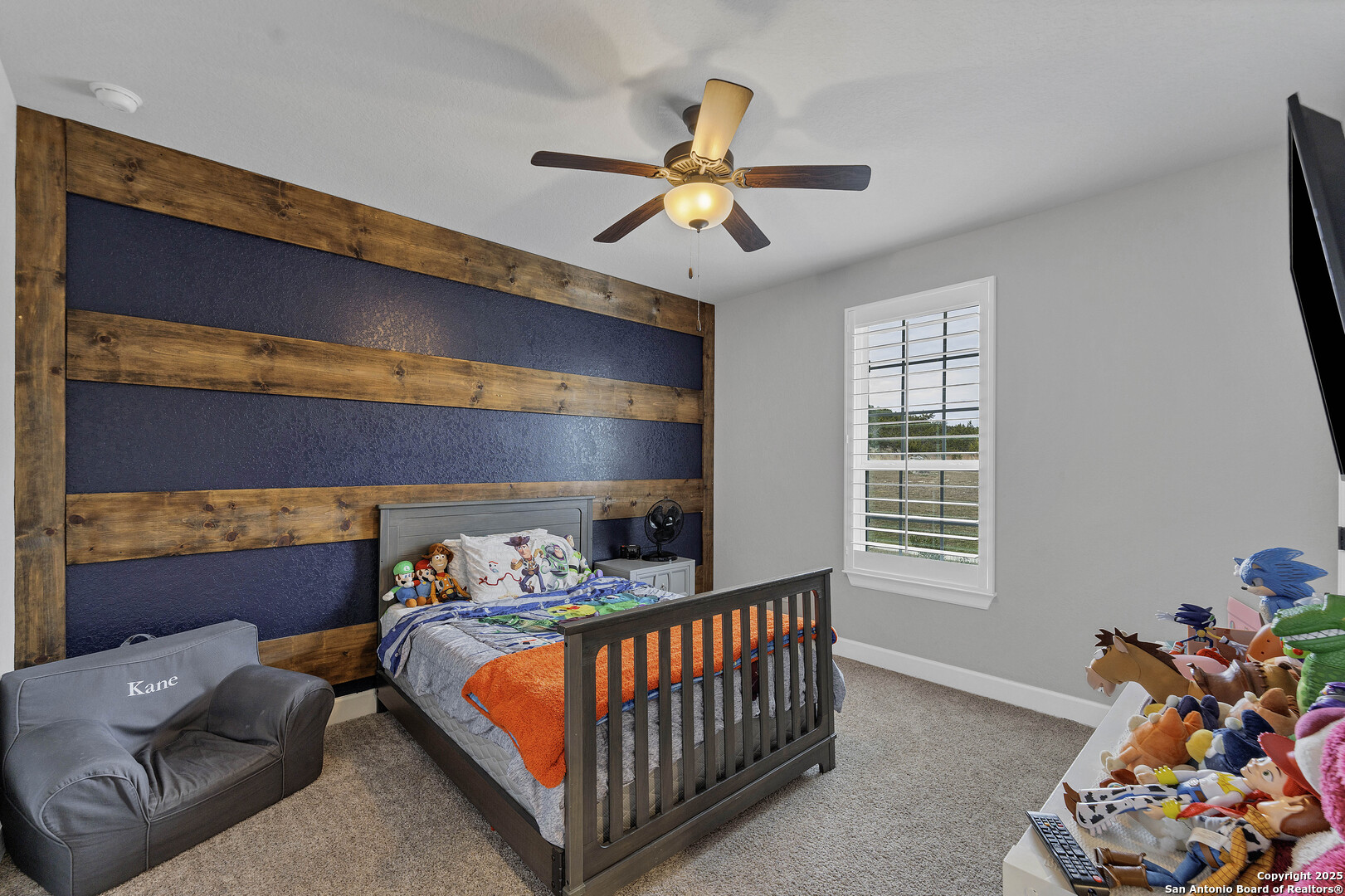 1033 Mystic Shores Boulevard Spring Branch, TX 78070 - Photo 14 of 39 a bedroom with a bed and a window