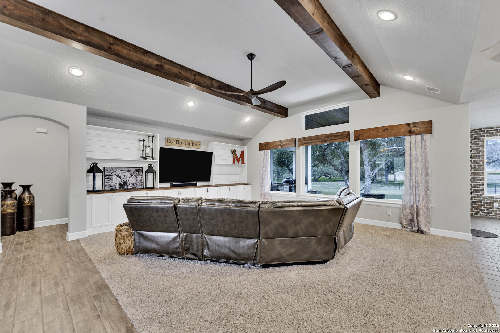 1033 Mystic Shores Boulevard Spring Branch, TX 78070 - Photo 23 of 39 a living room with furniture and a flat screen tv
