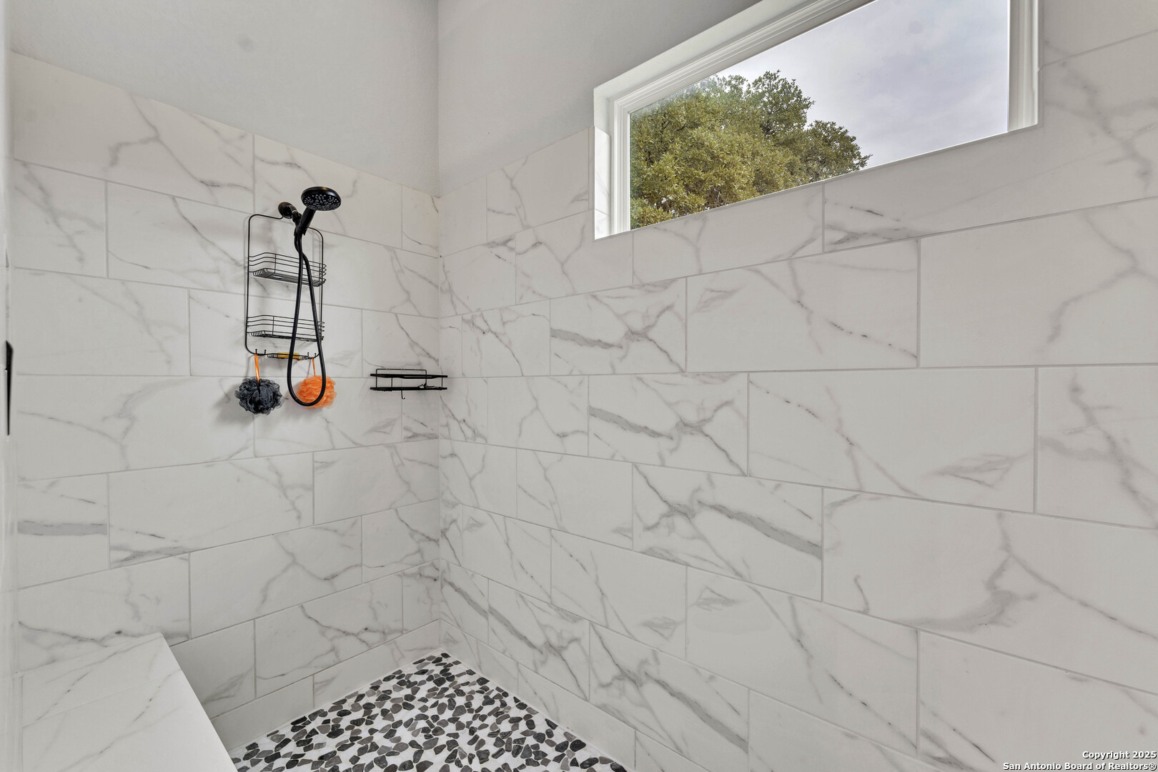 1033 Mystic Shores Boulevard Spring Branch, TX 78070 - Photo 28 of 39 a bathroom with a shower