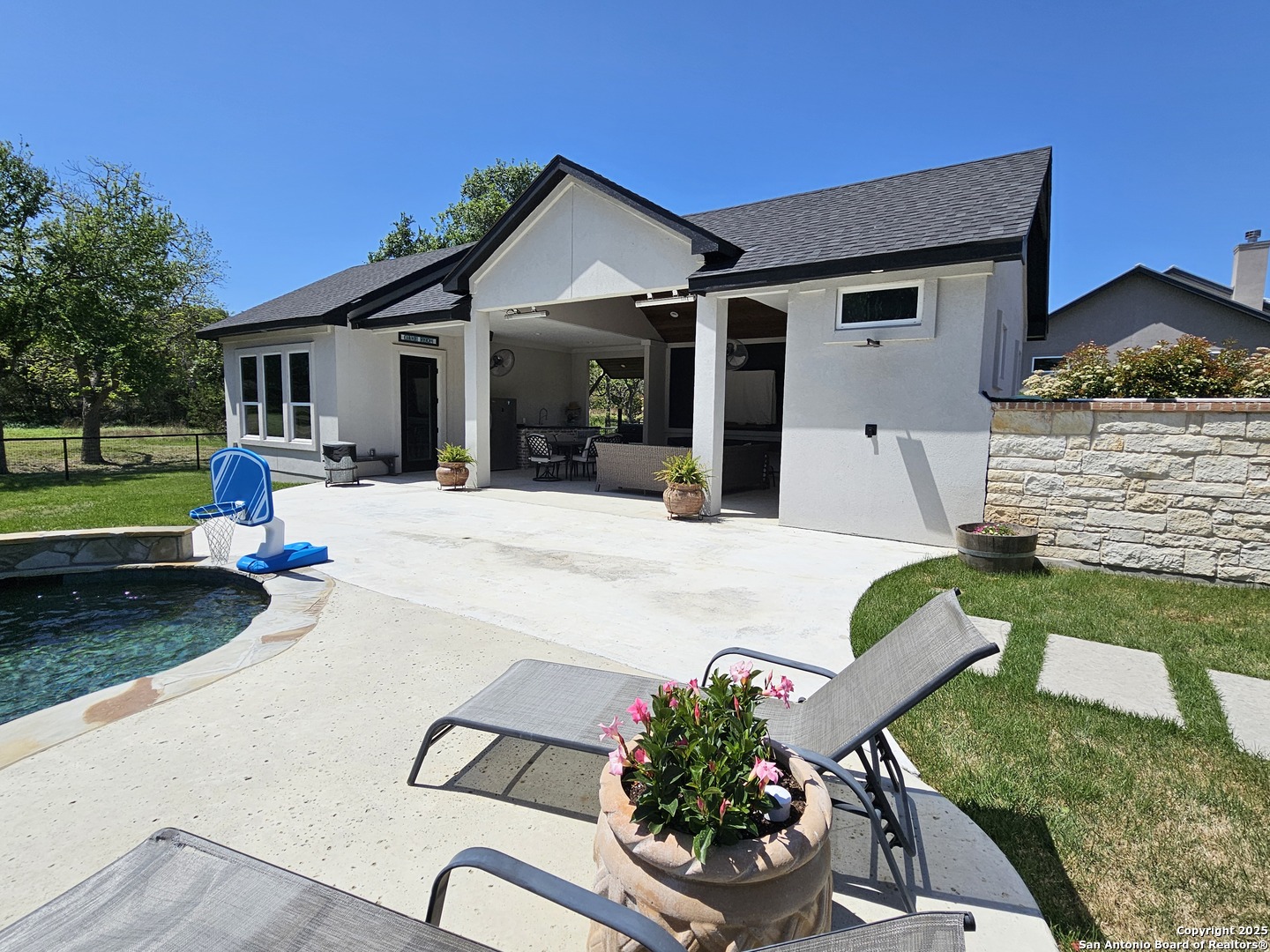 1033 Mystic Shores Boulevard Spring Branch, TX 78070 - Photo 33 of 39 a front view of a house with porch