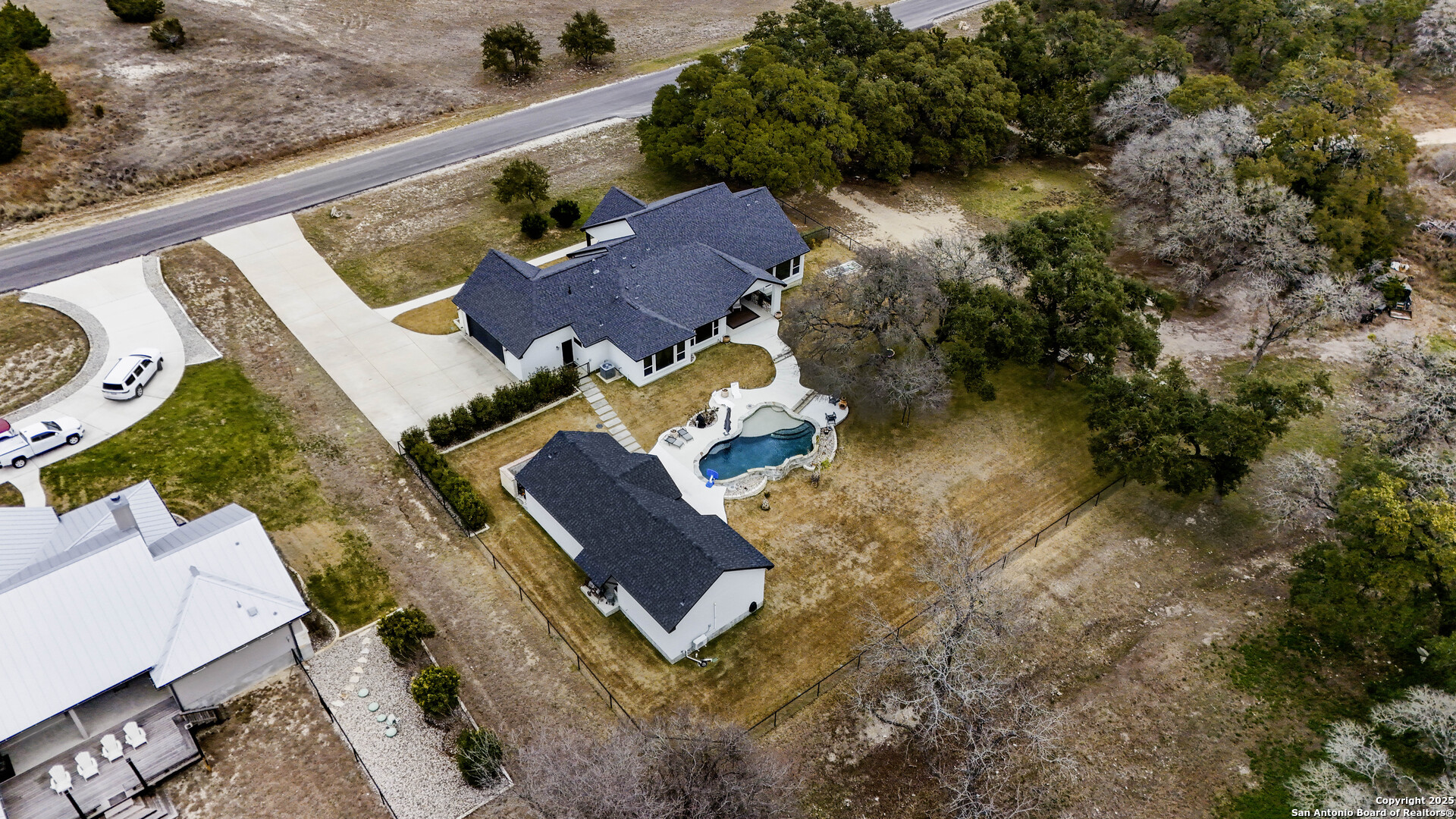 1033 Mystic Shores Boulevard Spring Branch, TX 78070 - Photo 4 of 39 an aerial view of houses with yard