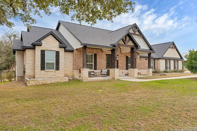 a front view of a house with swimming pool