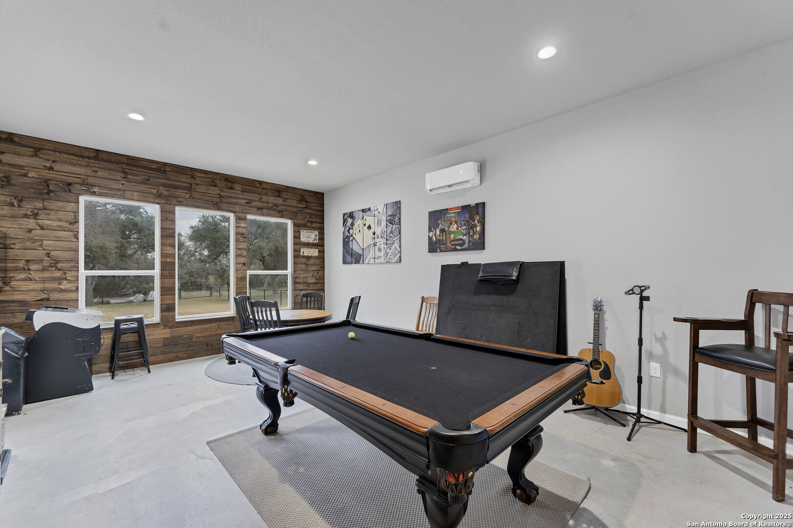1033 Mystic Shores Boulevard Spring Branch, TX 78070 - Photo 9 of 39 a living room with furniture pool table and a large window