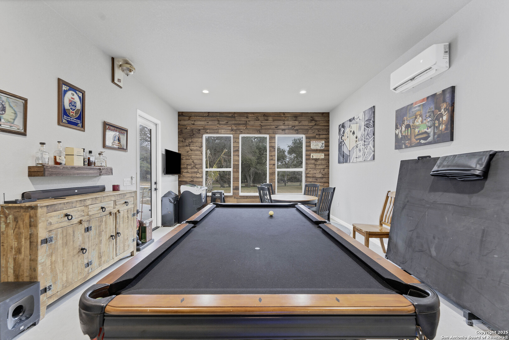 1033 Mystic Shores Boulevard Spring Branch, TX 78070 - Photo 10 of 39 a room with furniture pool table and windows