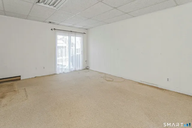 an empty room with windows