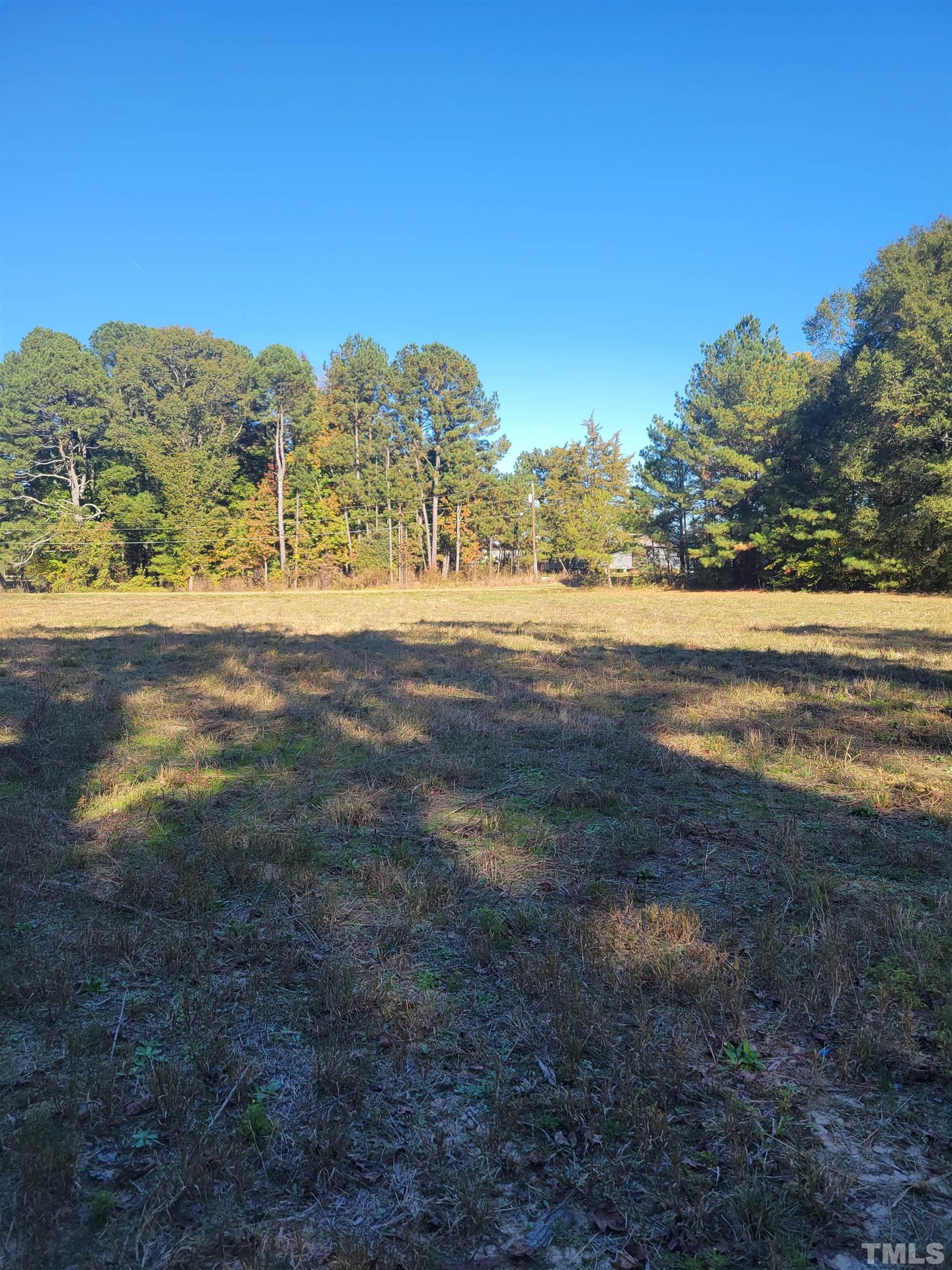 2 Riley Hill Road Zebulon, NC 27597 - Photo 2 of 5 a view of an ocean and beach