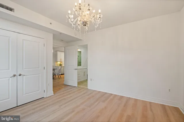 a bathroom with a sink a toilet a shower and a mirror