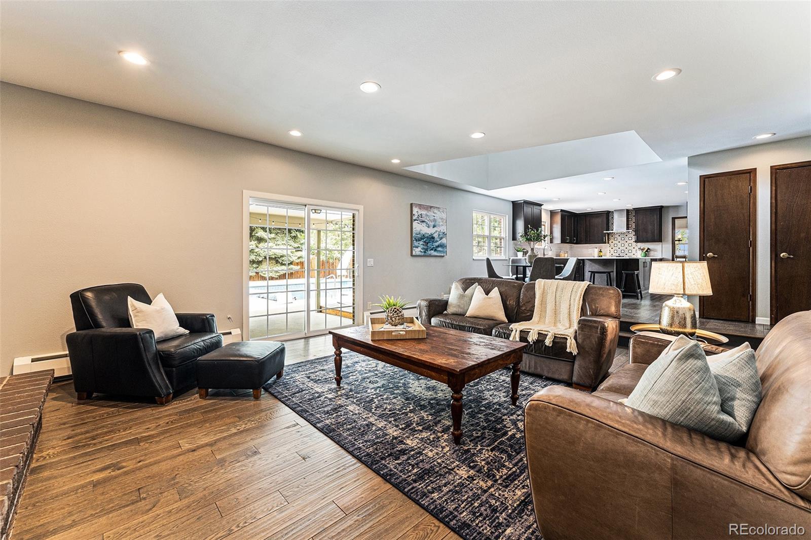 217 South Deframe Way Golden, CO 80401 - Photo 12 of 34 a living room with furniture and wooden floor