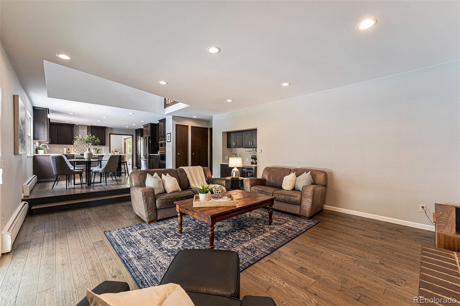 217 South Deframe Way Golden, CO 80401 - Photo 13 of 34 a living room with furniture and a wooden floor