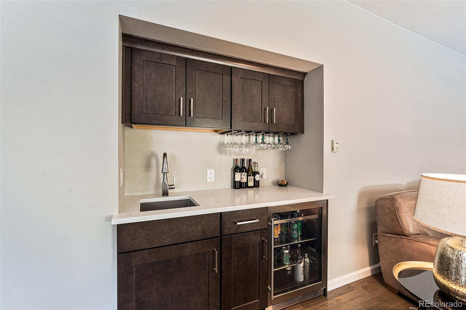 217 South Deframe Way Golden, CO 80401 - Photo 14 of 34 a kitchen with a sink cabinets and a window