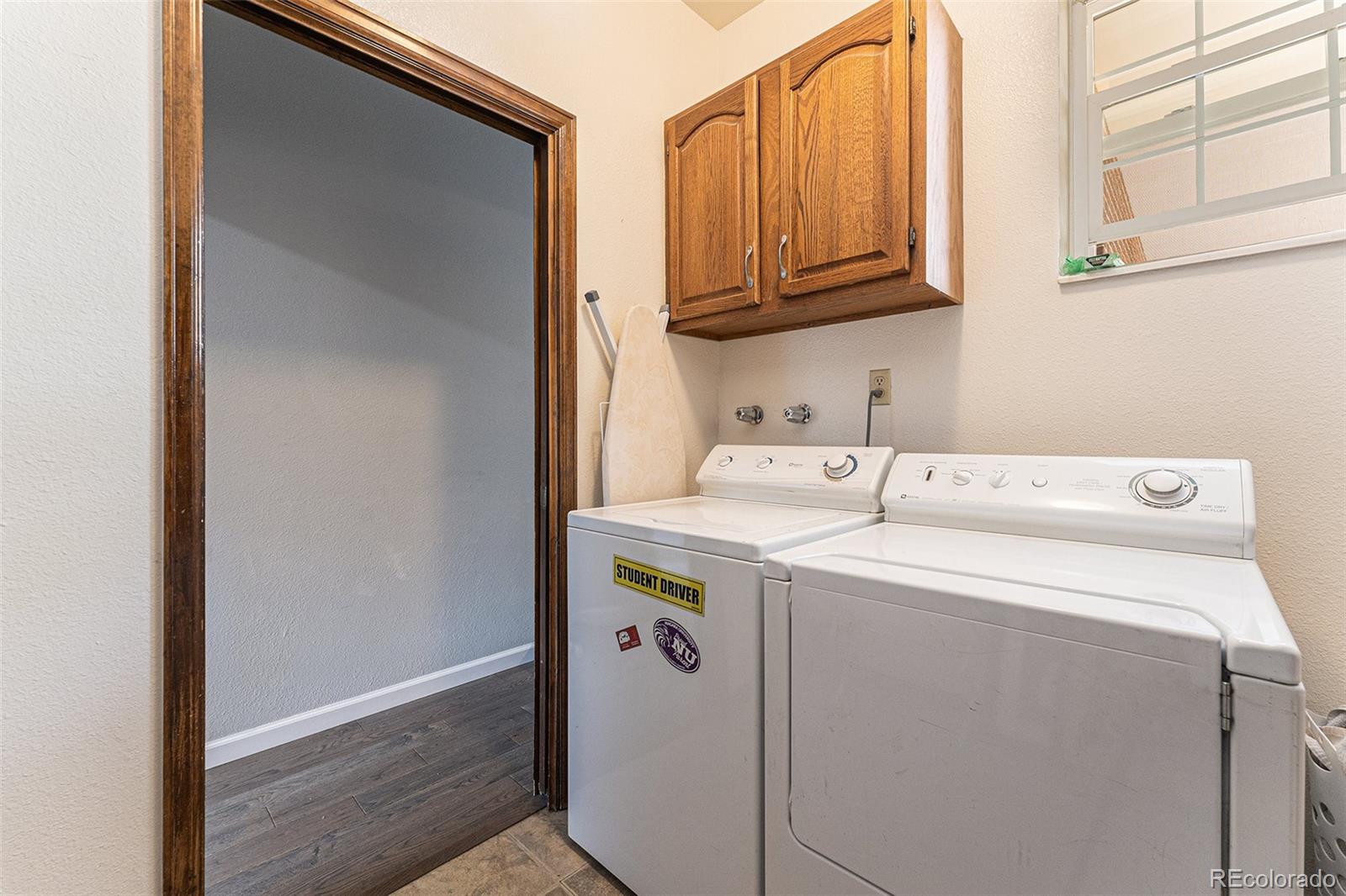 217 South Deframe Way Golden, CO 80401 - Photo 15 of 34 a utility room with dryer and washer