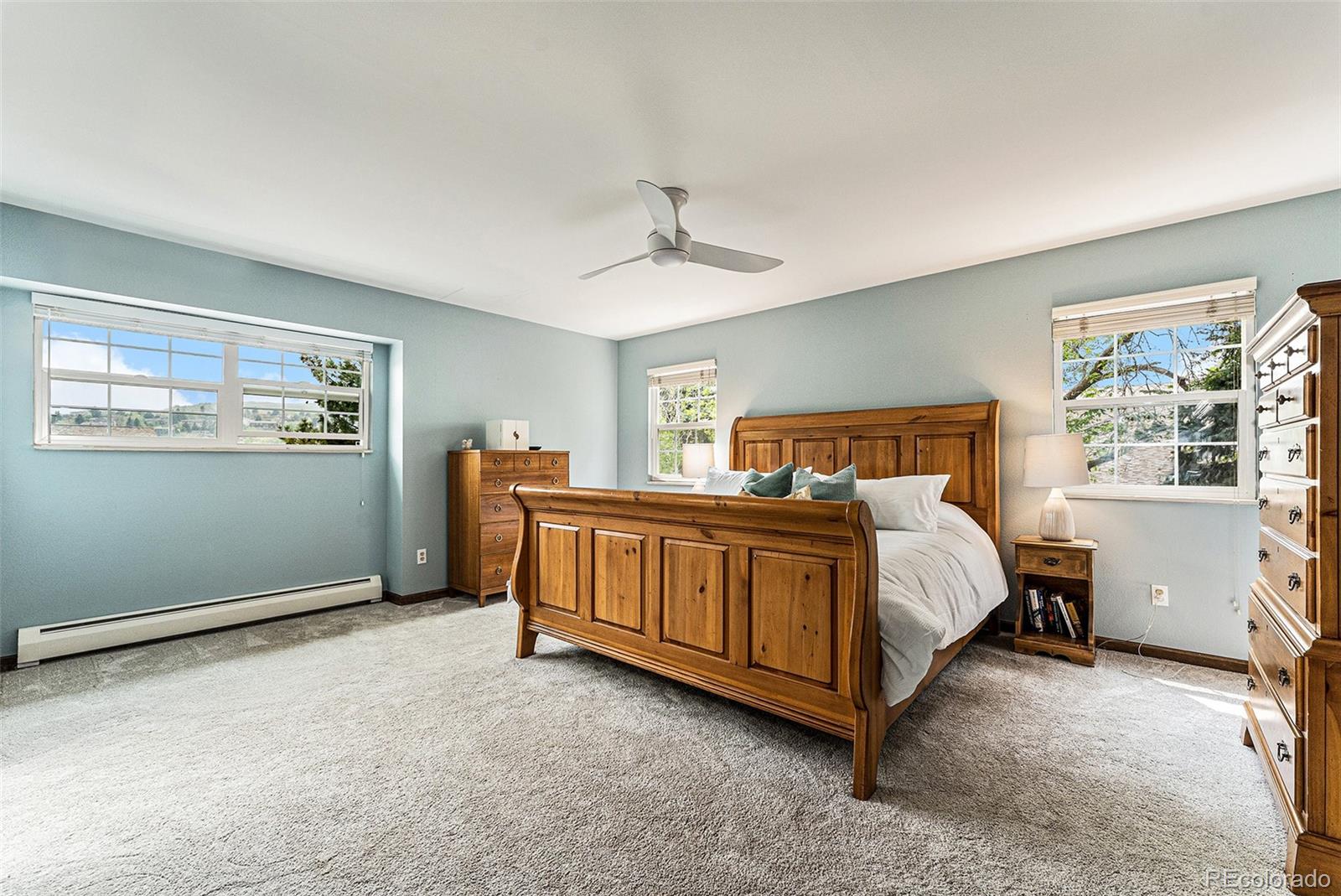 217 South Deframe Way Golden, CO 80401 - Photo 19 of 34 a bedroom with a bed and a window