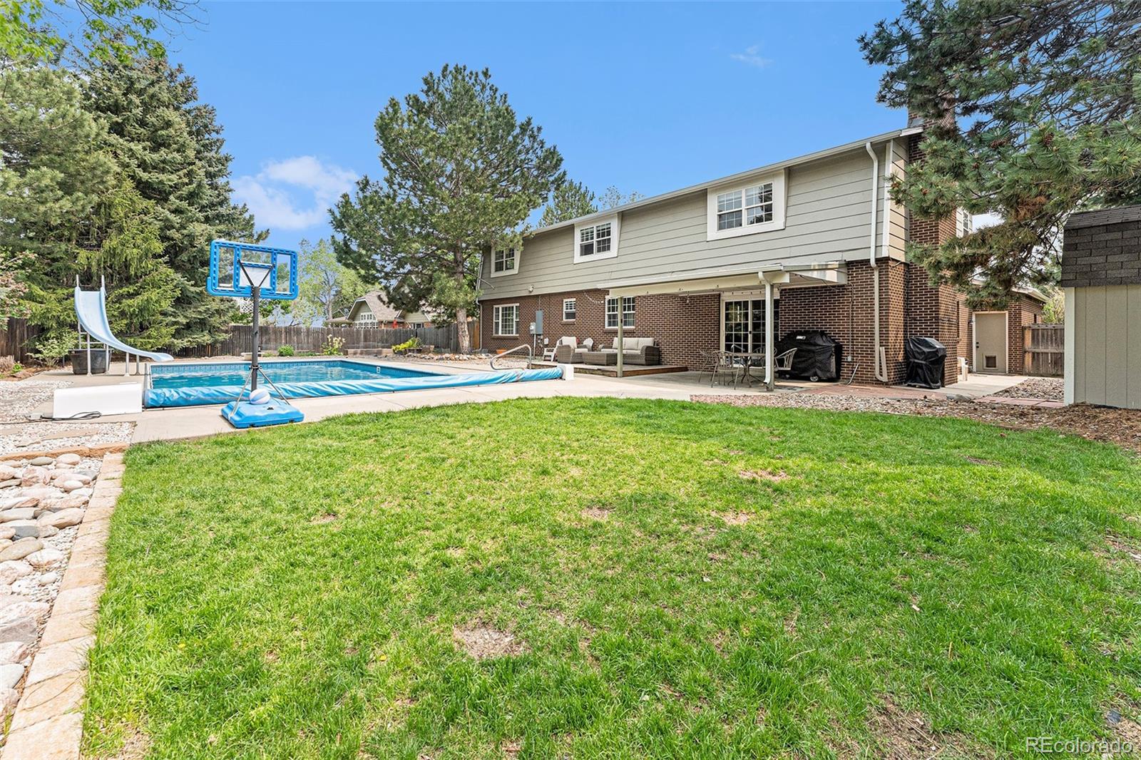 217 South Deframe Way Golden, CO 80401 - Photo 28 of 34 a view of a house with a yard porch and sitting area