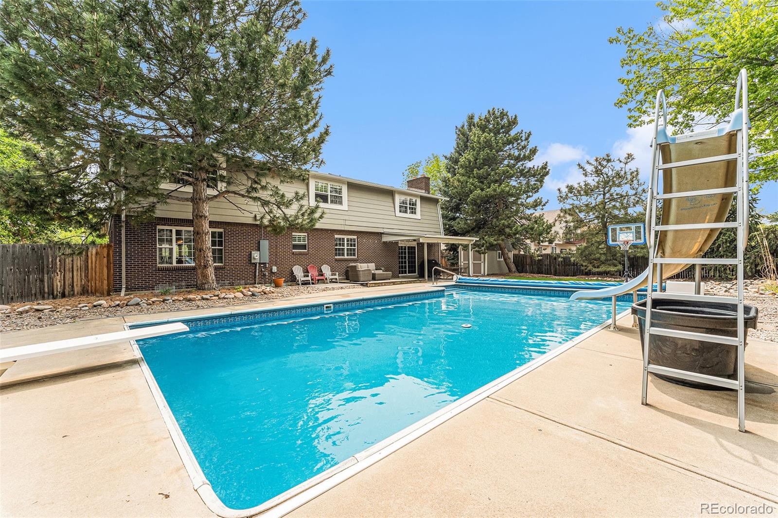 217 South Deframe Way Golden, CO 80401 - Photo 29 of 34 a view of a house with a swimming pool