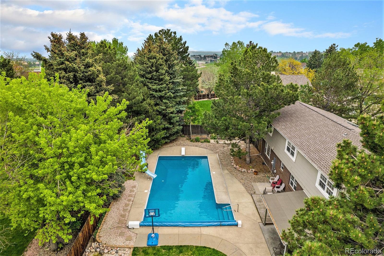 217 South Deframe Way Golden, CO 80401 - Photo 30 of 34 a backyard of a house with lots of green space