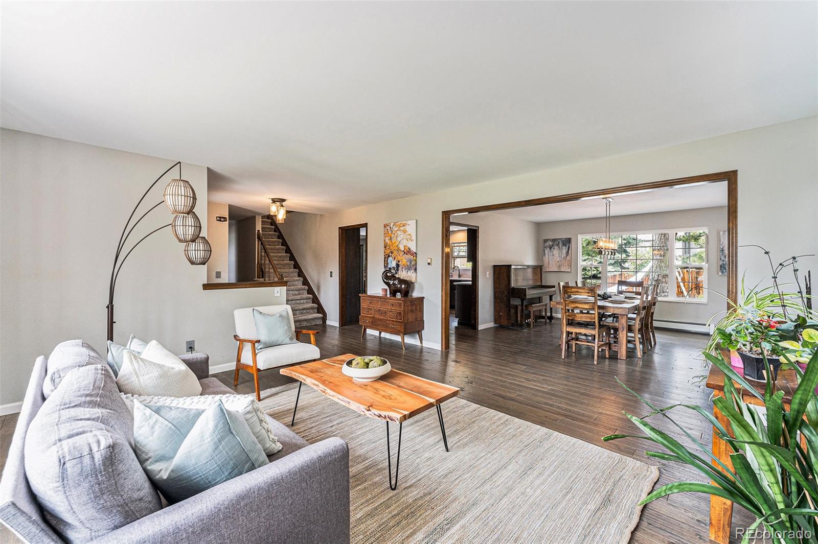 217 South Deframe Way Golden, CO 80401 - Photo 3 of 34 a living room with furniture and a large window