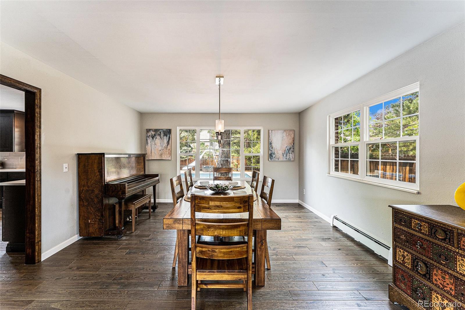 217 South Deframe Way Golden, CO 80401 - Photo 10 of 34 a living room with furniture and a wooden floor