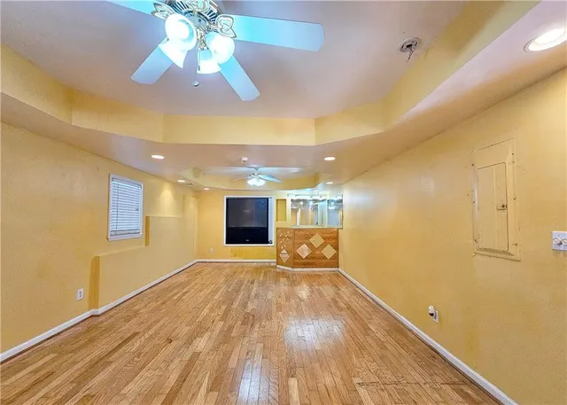 a view of a swimming pool with a yard