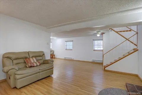a bath room with a sink and a window