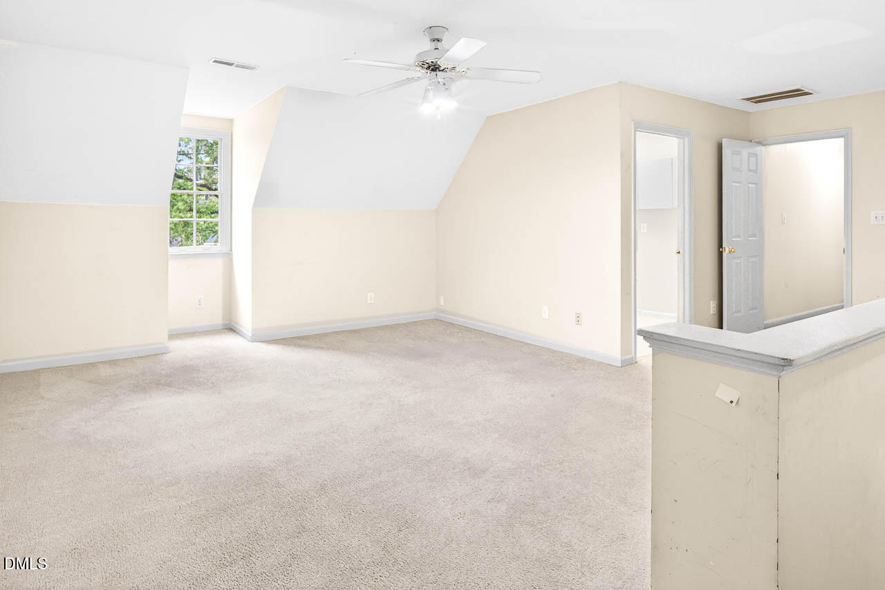 2209 Lodestar Drive Raleigh, NC 27615 - Photo 43 of 50 an empty room with windows and fan
