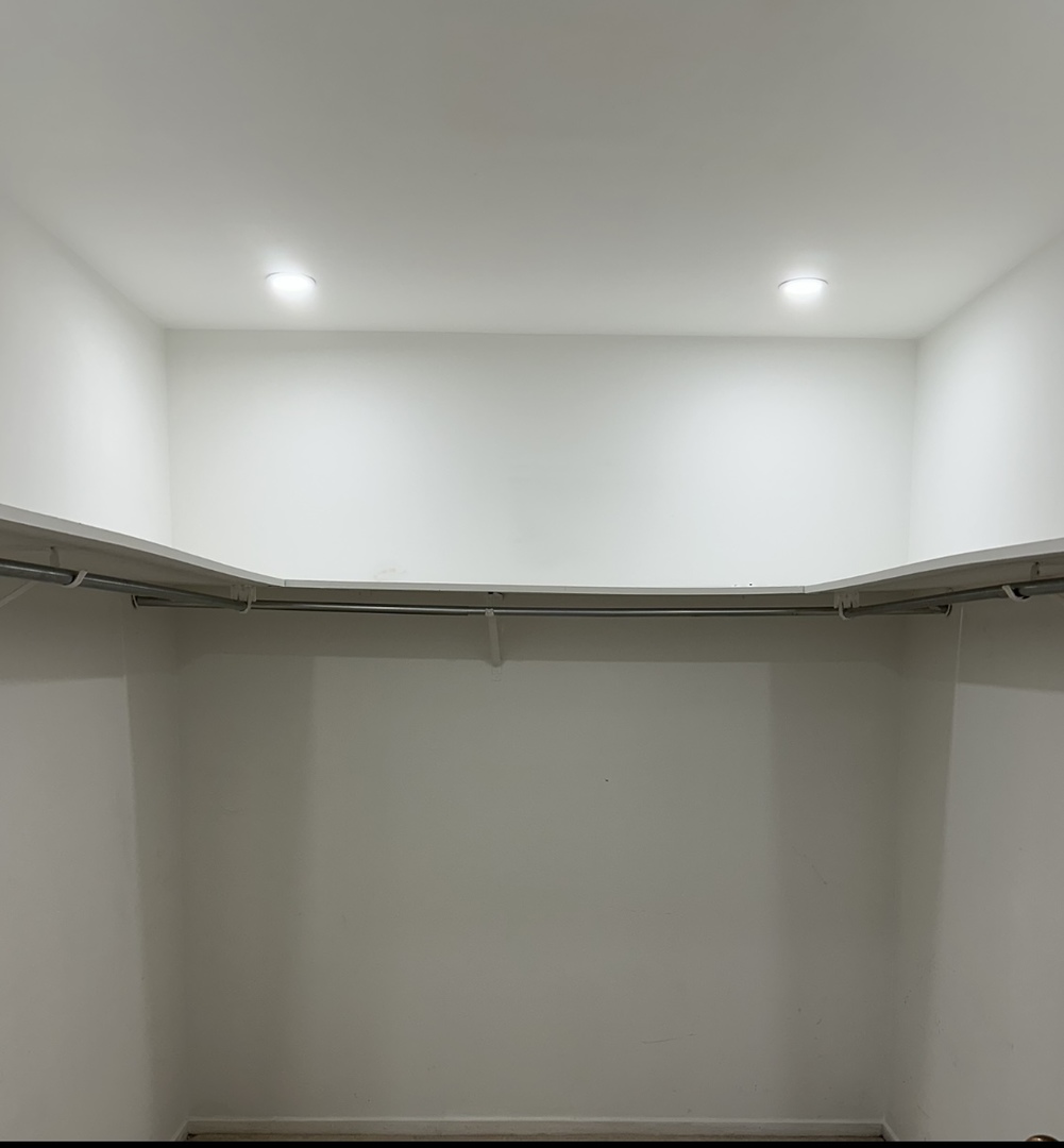 431 South Dearborn Street, Unit 507 Chicago, IL 60605 - Photo 12 of 25 an empty room with a wooden floor