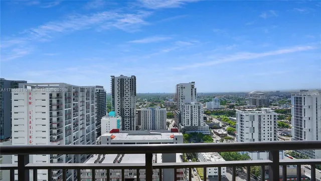 a view of a city from a balcony