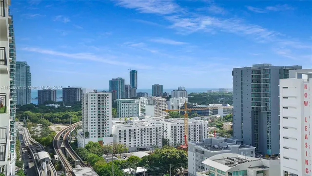 a view of a city with tall buildings