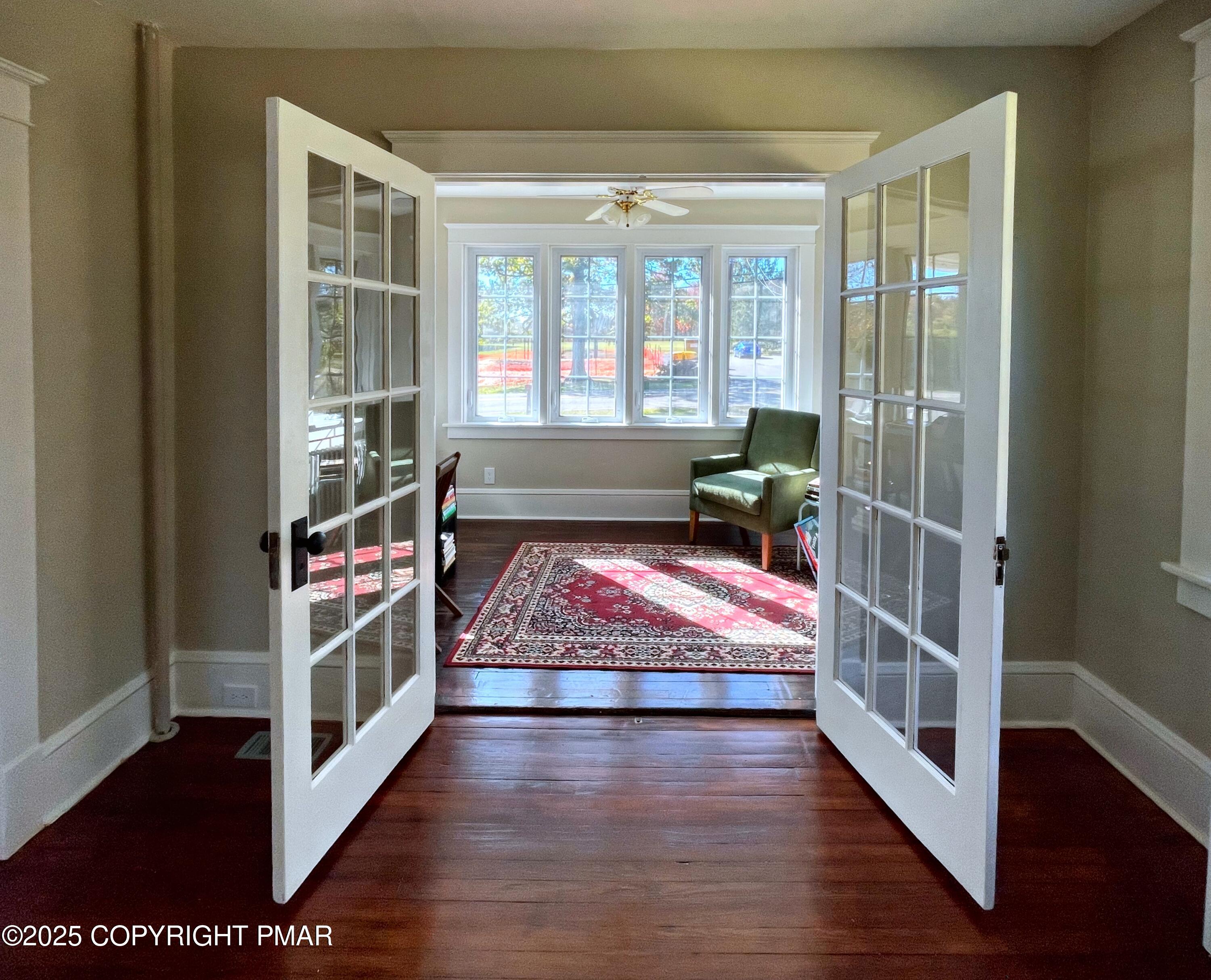 3035 Church Road Mountain Top, PA 18707 - Photo 12 of 27 a view of a bedroom with wooden floor and windows