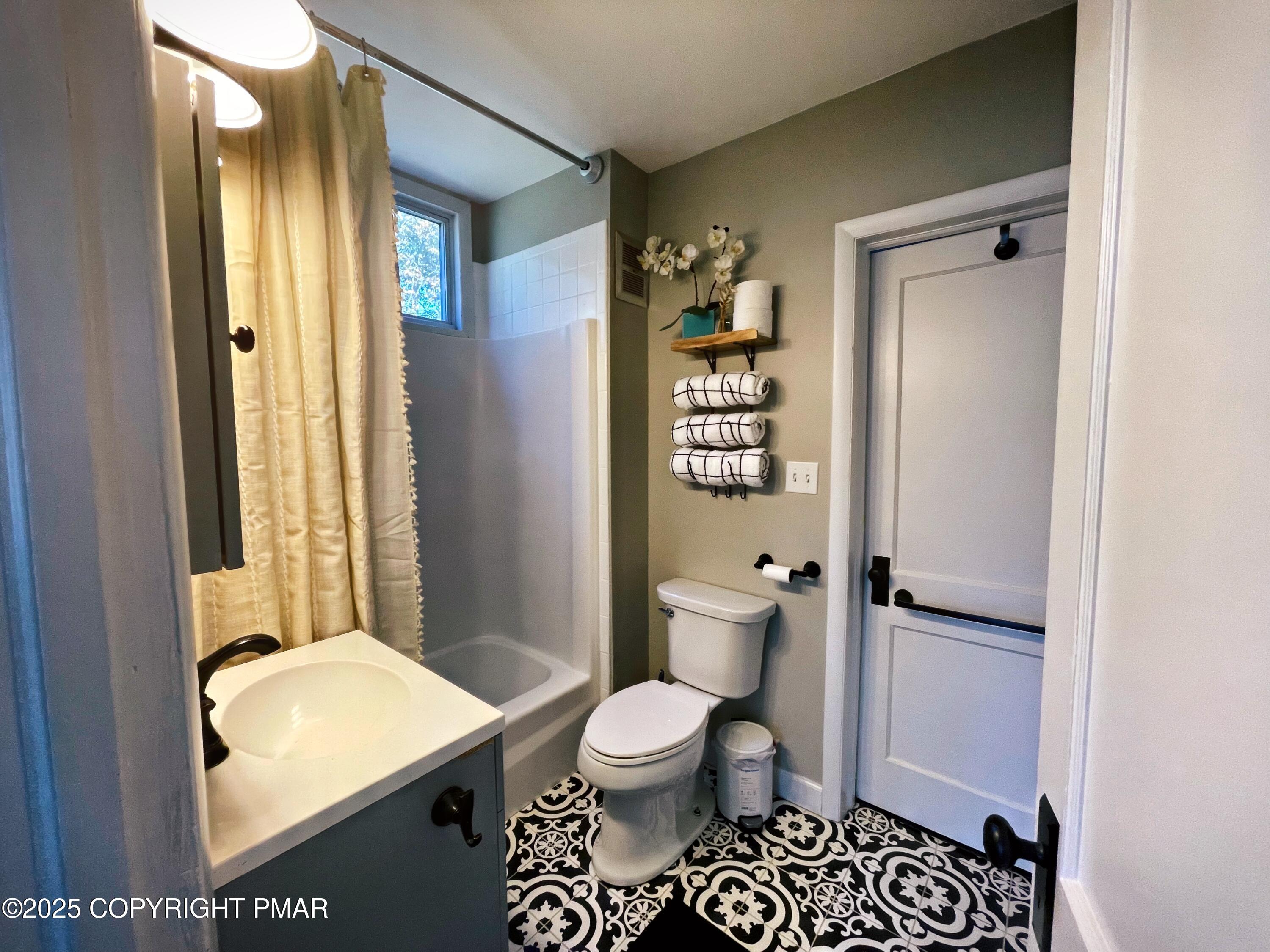 3035 Church Road Mountain Top, PA 18707 - Photo 14 of 27 a bathroom with a toilet and a shower