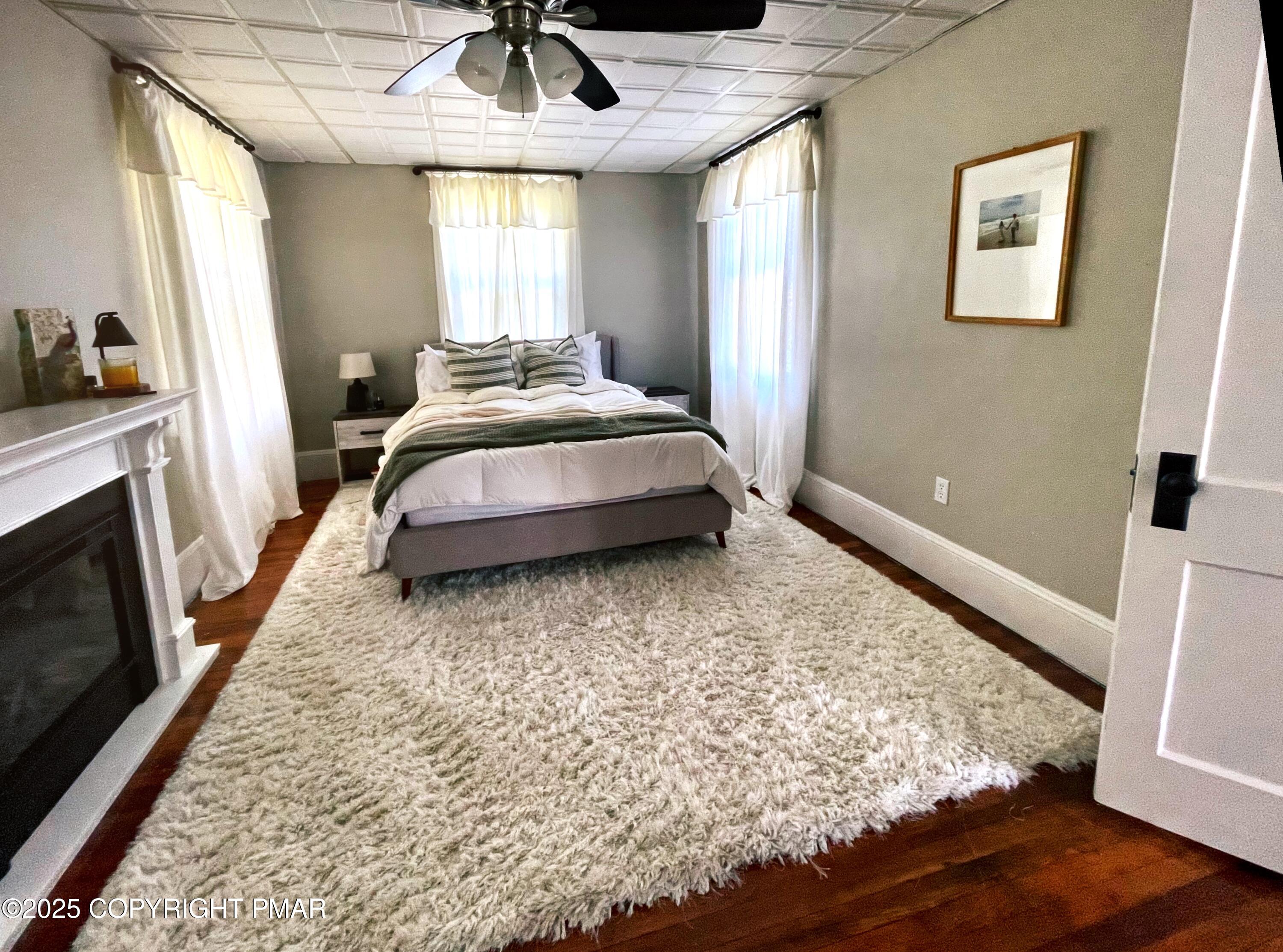 3035 Church Road Mountain Top, PA 18707 - Photo 16 of 27 a spacious bedroom with a bed and a dresser next to a window