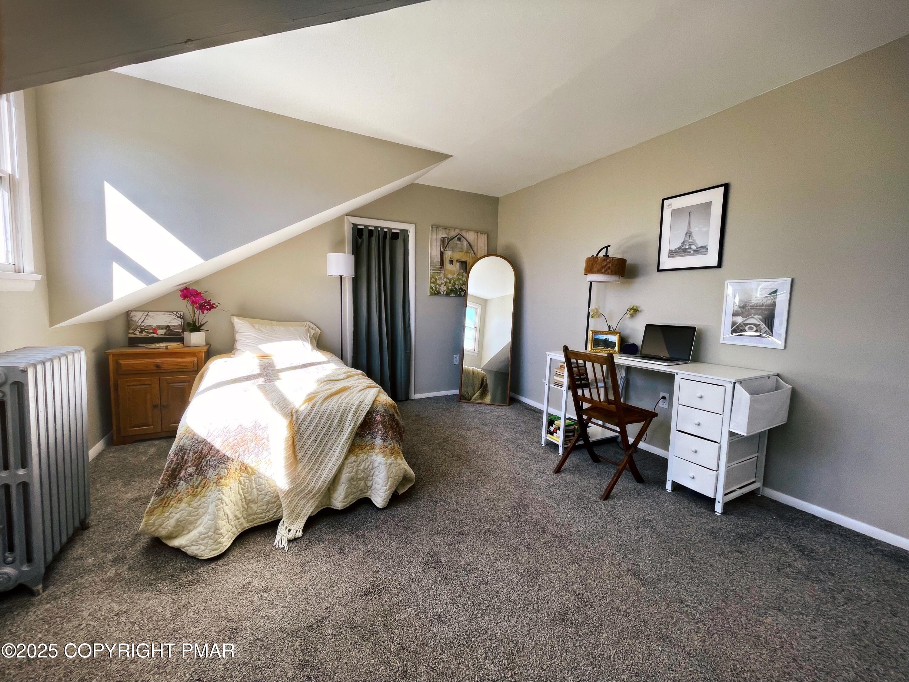3035 Church Road Mountain Top, PA 18707 - Photo 20 of 27 a bed room with a bed and a chair