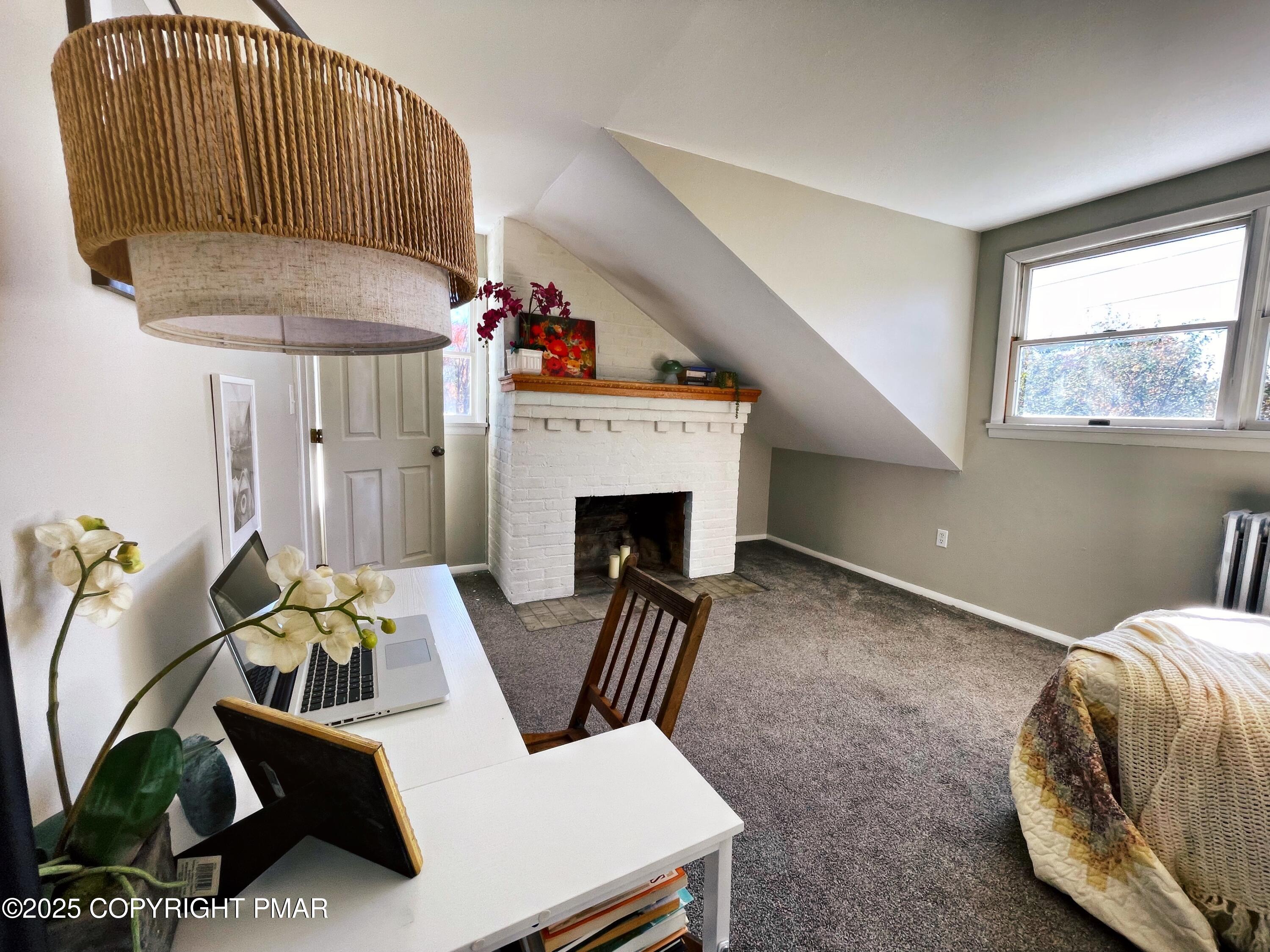 3035 Church Road Mountain Top, PA 18707 - Photo 23 of 27 a living room with furniture and a fireplace