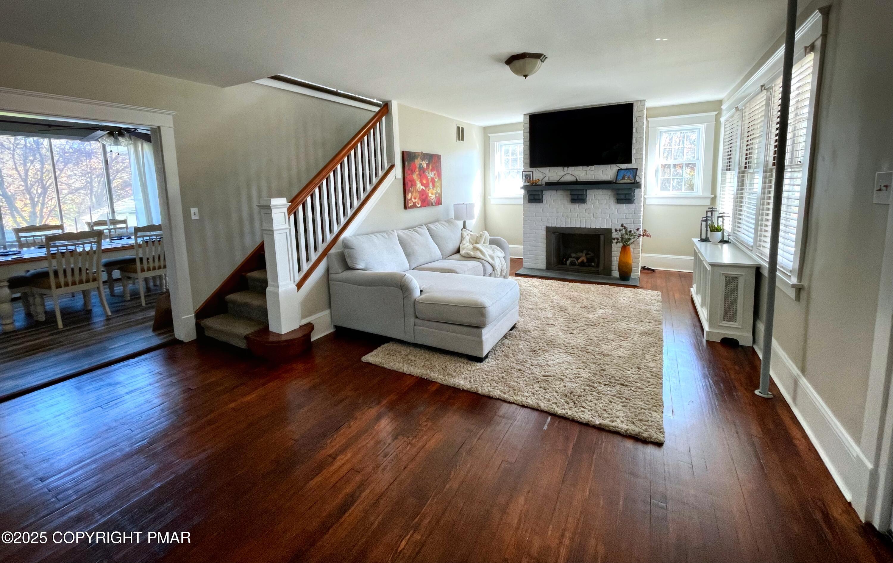 3035 Church Road Mountain Top, PA 18707 - Photo 5 of 27 a living room with furniture fireplace and flat screen tv