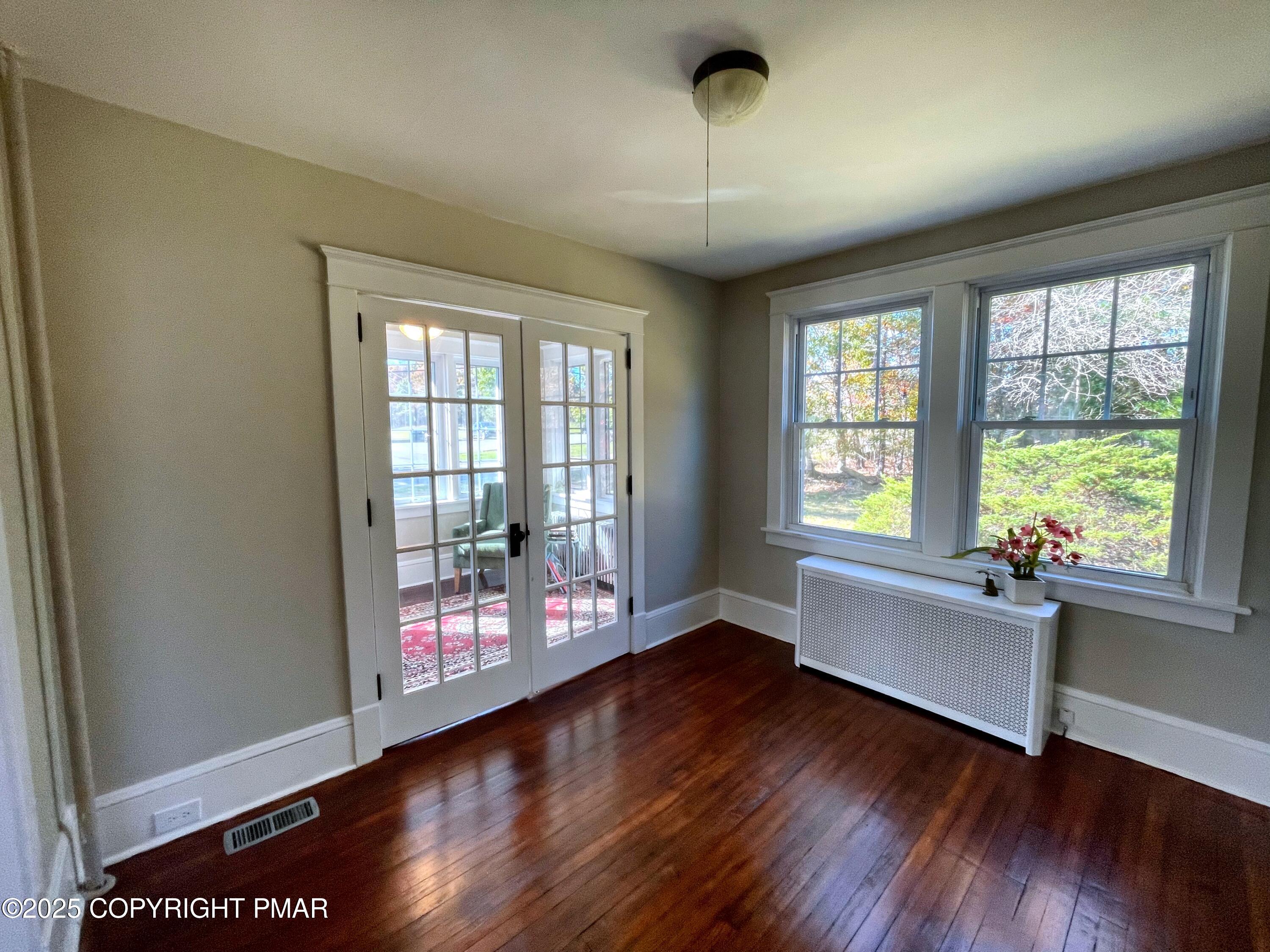 3035 Church Road Mountain Top, PA 18707 - Photo 9 of 27 a view of an empty room with wooden floor and a window