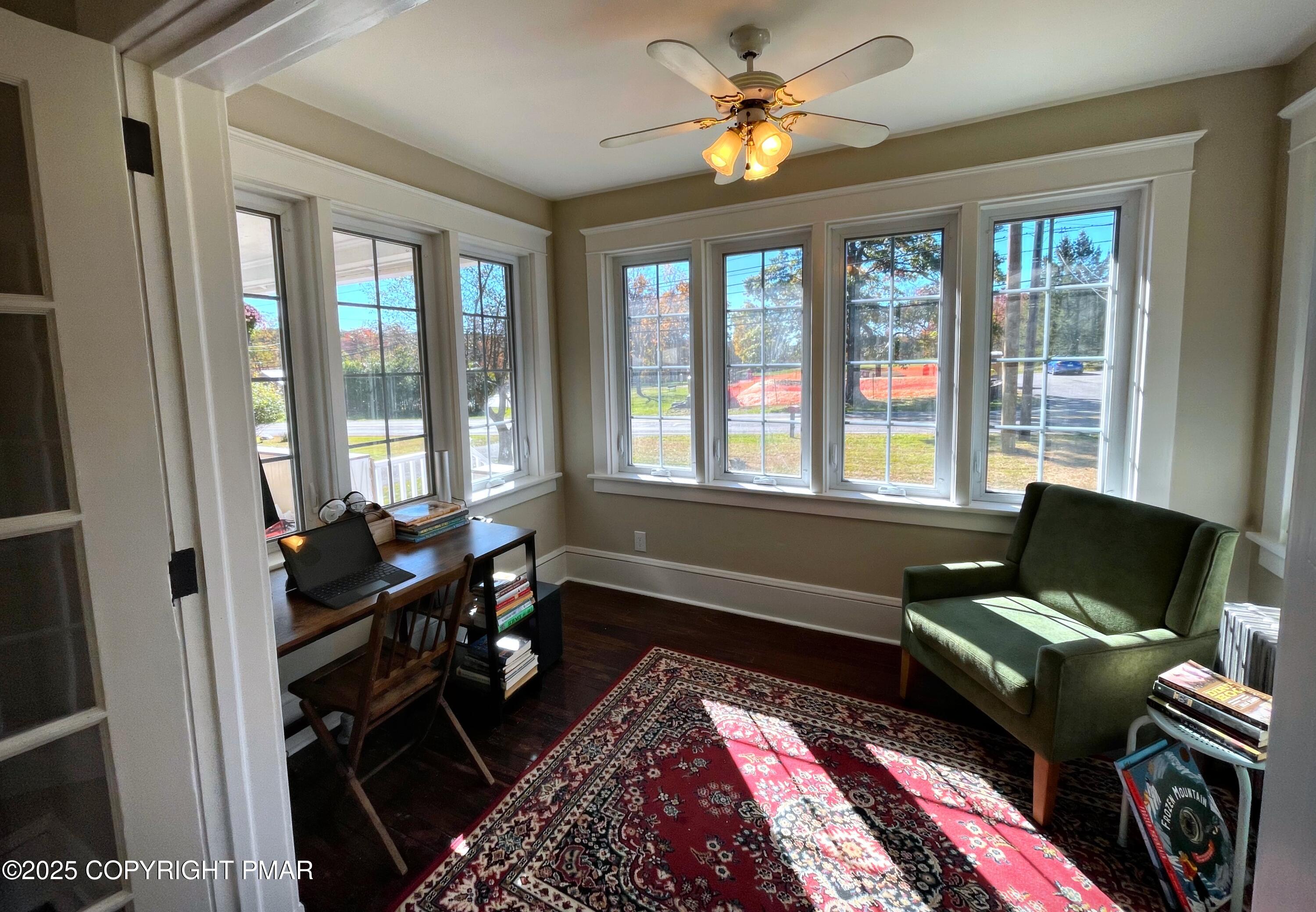 3035 Church Road Mountain Top, PA 18707 - Photo 10 of 27 a living room with furniture two window and a flat screen tv