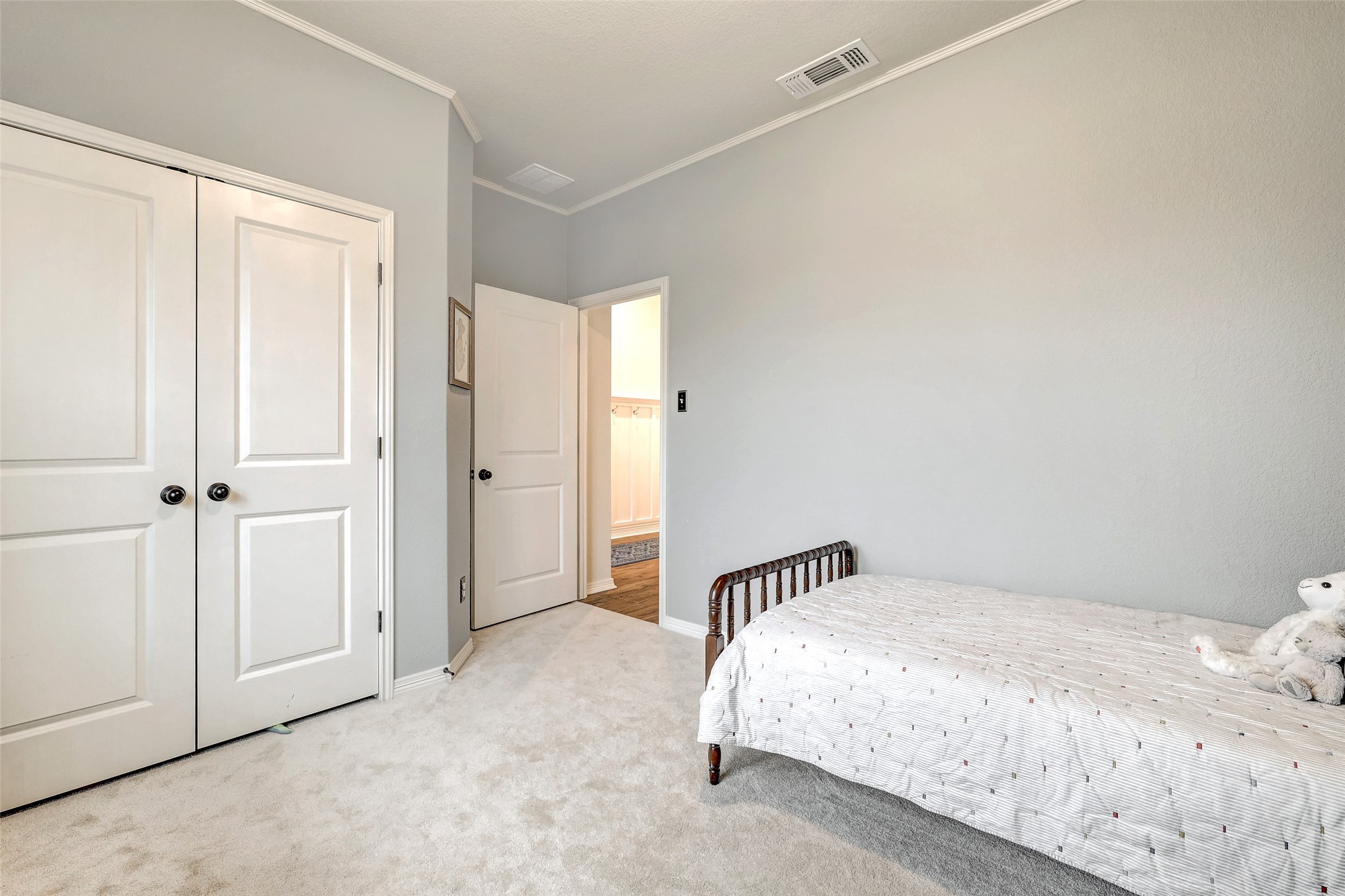 1117 Spring Gulch Lane Georgetown, TX 78628 - Photo 29 of 39 A comforting bedroom space, ideal for peaceful rest and relaxation.